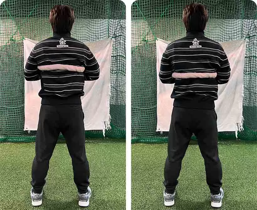 タオルをセットして前に通す。タオルの位置の背骨部分を意識してシャドースイングしてみる。「ヒジの高さ」とどちらがスムーズにスイングできるか？